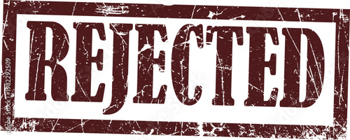Dark brown grunge rubber stamp impression with the word rejected in bold serif font