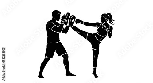Female kickboxer training with a partner.