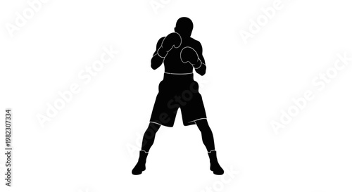 Silhouette of a male boxer in fighting stance.