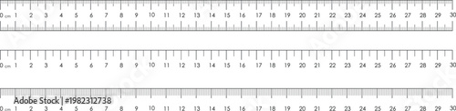 Three precise black and white ruler scales showing metric measurements clearly marked for accuracy	
