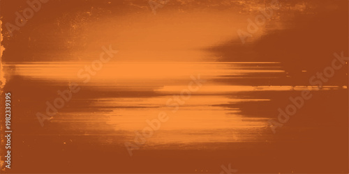 Beautiful summer landscape of a bright orange sunset over the sea with colorful clouds reflecting sunlight across the horizon at dusk