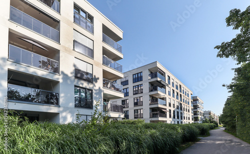 Cityscape of a residential area with modern sustainable apartment buildings, new green urban landscape in the city