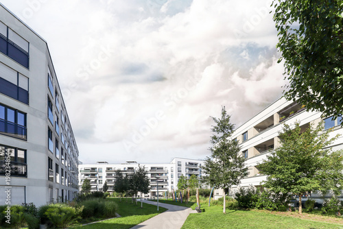 Cityscape of a residential area with modern sustainable apartment buildings, new green urban landscape in the city
