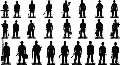Set of professional male construction worker silhouettes wearing hard hats and holding industrial tools standing on grass isolated on white background