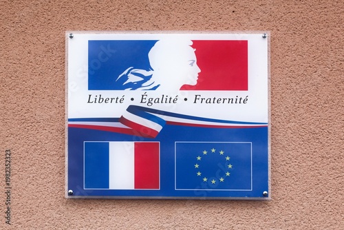 Liberty, equality and fraternity on a wall of a city-hall in France the motto of the French revolution