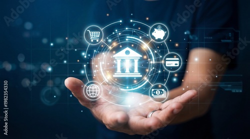 Hand holding glowing global real estate investment hologram with financial icons and network
