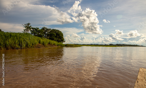clouds over the amazon river
