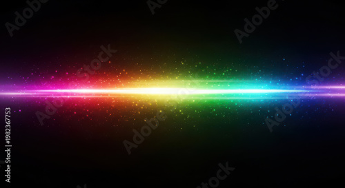 Colorful light explosion and glowing particles on black background.