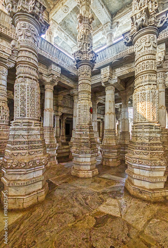 Ranakpur Jain Temple in Rajasthan, built in the 15th century and dedicated to Adinatha, is famed for its marble design, 1,444 unique pillars, symmetry, and serene spiritual ambiance.