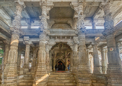 Ranakpur Jain Temple in Rajasthan, built in the 15th century and dedicated to Adinatha, is famed for its marble design, 1,444 unique pillars, symmetry, and serene spiritual ambiance.