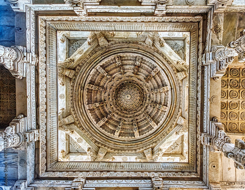 Ranakpur Jain Temple in Rajasthan, built in the 15th century and dedicated to Adinatha, is famed for its marble design, 1,444 unique pillars, symmetry, and serene spiritual ambiance.