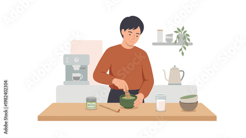 Man preparing green matcha tea with a whisk in a kitchen
