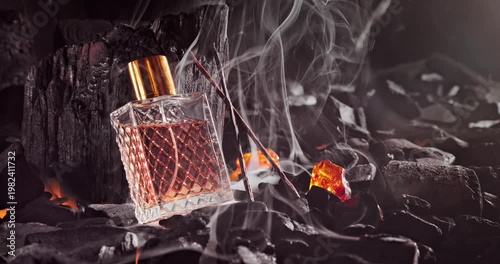 Unique incense perfume on a hearth with wood and amber.