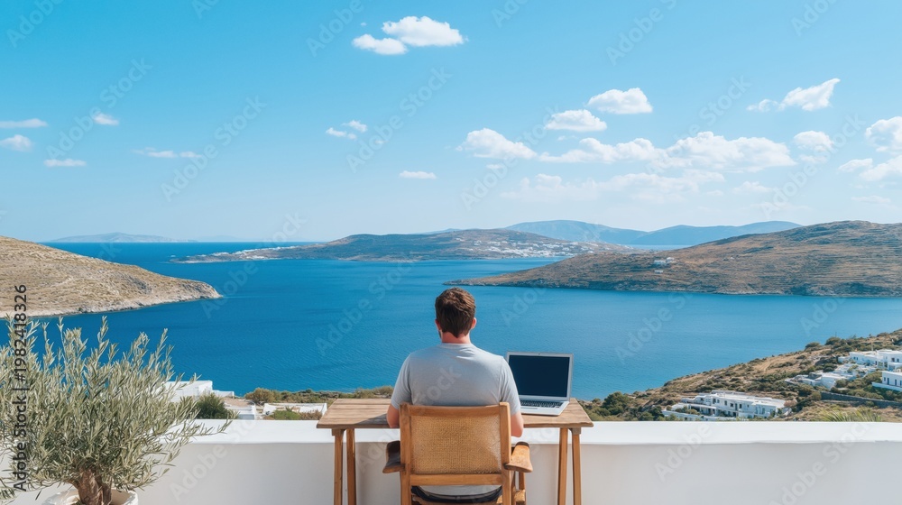 Obraz premium Man focusing on his laptop, working from a terrace with a stunning panoramic view of the sea and islands