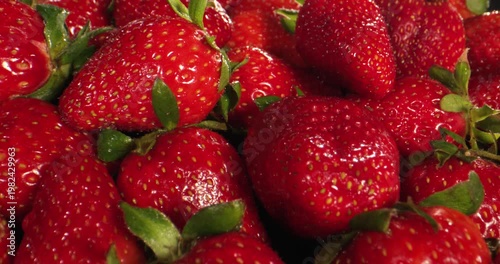 Closeup Of Luscious Strawberries With Dew Highlights And Vibrant Colors