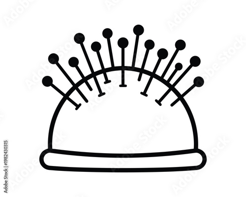 Pincushion with pins, sewing equipment for needlework and dressmaking.