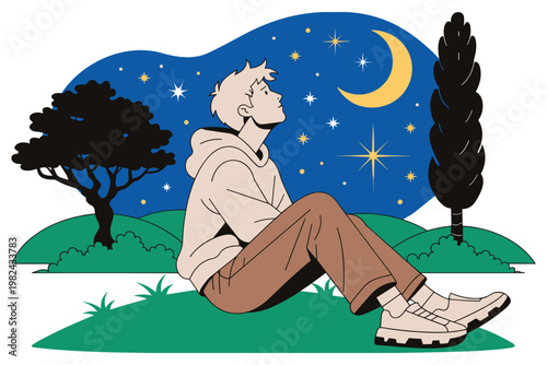 Man sitting on grass at night looking at moon and stars.