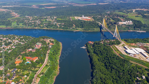 Картината върху платно Iguazu and Parana rivers confluence at triple border with Integration Bridge