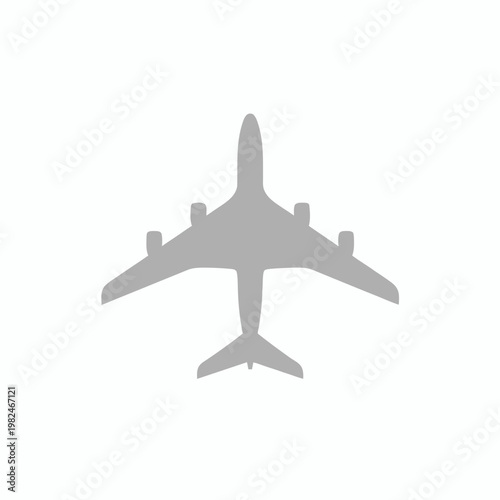 Airplane flies through clear sky with wings spread wide outdoors