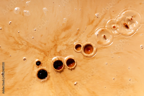 Wallpaper Mural Top view of black coffee splash on milk Torontodigital.ca