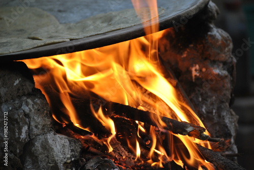 Burning Wood in Traditional Artisan Fire Pit