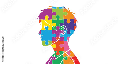 Profile silhouette of a person made from colorful jigsaw puzzle pieces.