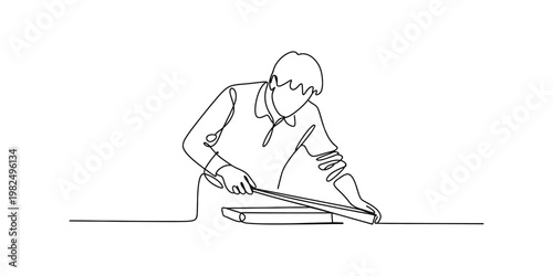 A single continuous line drawing of a man carefully working on a project at a flat work table Vector, illustration