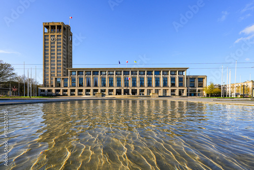 Le Havre City Hall reflected in fountain water, modernist concrete architecture by Auguste Perret in Normandy, France