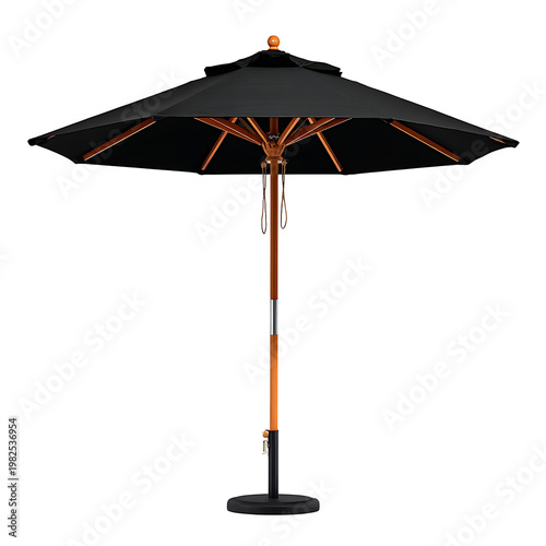 A large black patio umbrella stands on a backyard patio on a sunny day