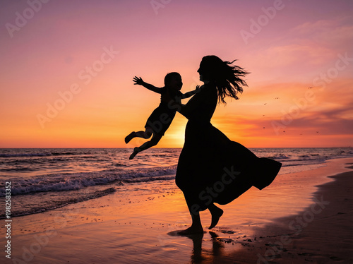 Silhouette of Mother Joyfully Lifting Child into the Air on a Beach at Sunset