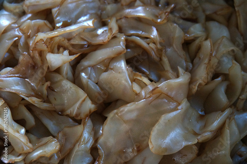 Thai Pad See Ew or Stir-fried Flat Rice Noodles with Dark Soy Sauce, Selective Focus