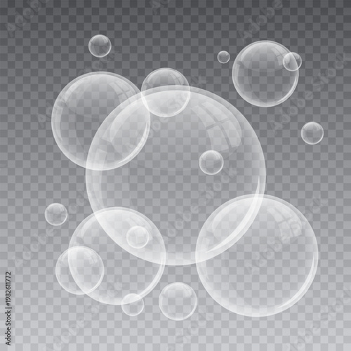 Floating soap bubbles on transparent background for graphic design element.