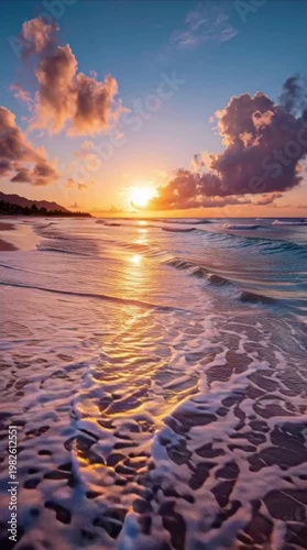 AIzaSyDgEIV5TQ7ClA84gHk1cKDLiL-3F7Hhpok Captivating Sunset Over Ocean Waves and Sandy Beach with Fiery Sky and Dramatic Clouds