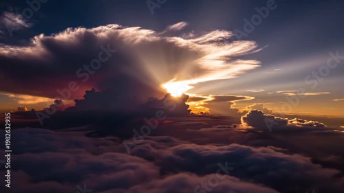Stunning aerial view of the sunset over the clouds.