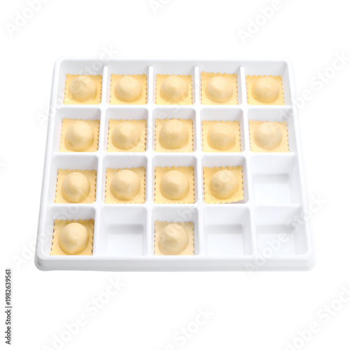 Frozen Cheese Ravioli in a White Plastic Tray, Top View, Isolated