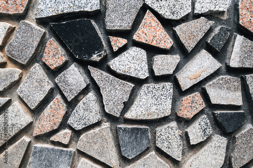 the background of the walls or floor is the texture of uneven granite masonry