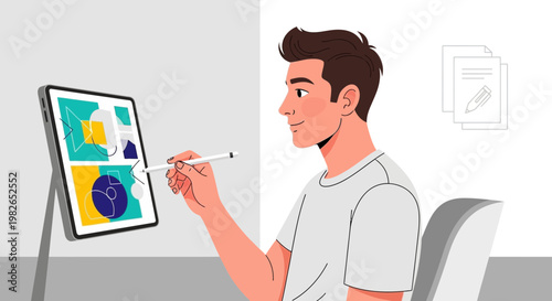 Graphic designer working on a tablet with digital stylus, modern workspace concept