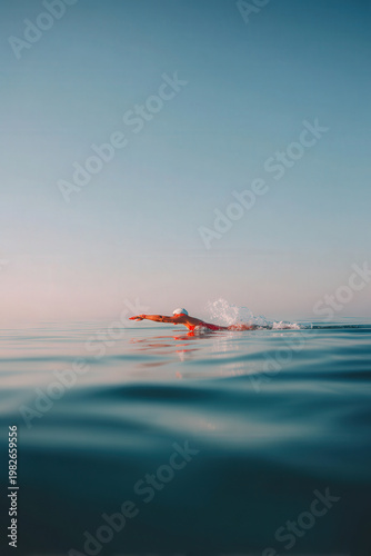 confident young woman poses in balanced stance against clean white wall eyes closed