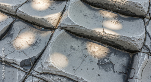 Close-Up of Textured Stone Surface with Sunlight