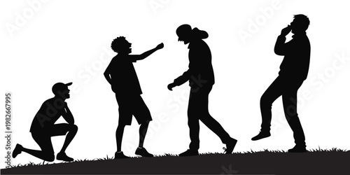 Black silhouette of a group of young male friends laughing and interacting together while spending leisure time outdoors on a grassy hillside with silhouette teenagers friendship laughing