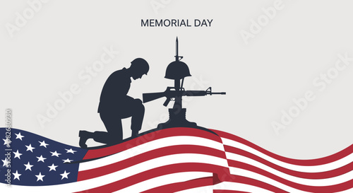 Memorial Day Soldier Kneeling at Fallen Soldier Memorial with American Flag