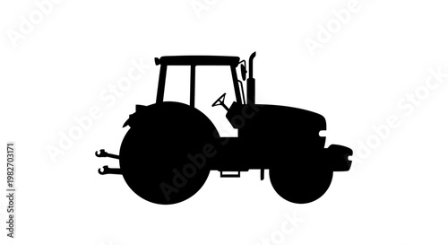 Silhouette of a modern tractor against a plain white background