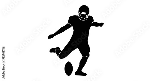 Silhouette of a football player kicking the ball in a dynamic pose