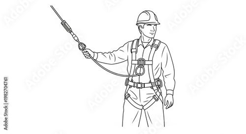Worker wearing safety harness and lanyard for fall protection.
