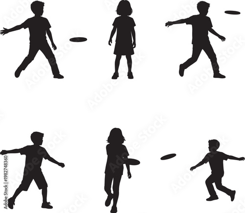Silhouettes of children playing with a frisbee