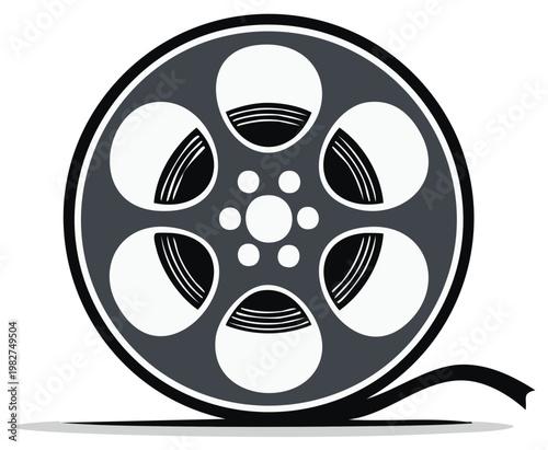 Vintage film reel with protruding strip symbolizing classic cinema and moviemaking