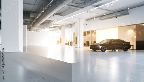 Modern Car Showroom with Sleek Vehicle Displayed.