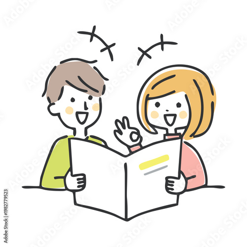 パンフレットを見ながら話し合う夫婦