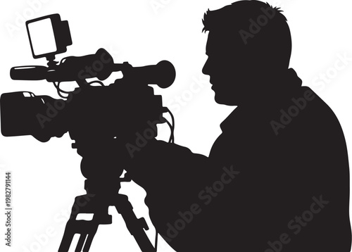 Silhouette of a man with a video camera