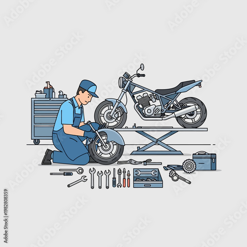 Motorcycle mechanic repairing a bike on a lift with tools spread around